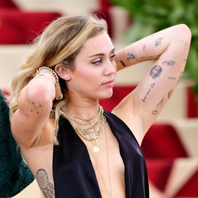 Listing Out Top Miley Cyrus Tattoos in Honor of Her Divorce. Miley Cyrus Tattoos Meaning