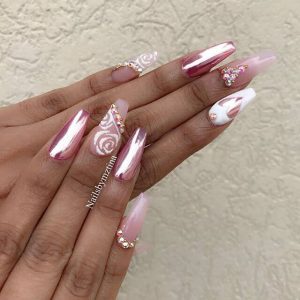 Funky Coordinated Pink Patterned Nails With Rhinestones