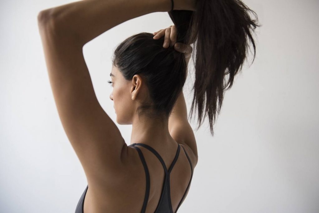 Tie Those Loose Strands of Hair. What to Wear When Working Out at the gym